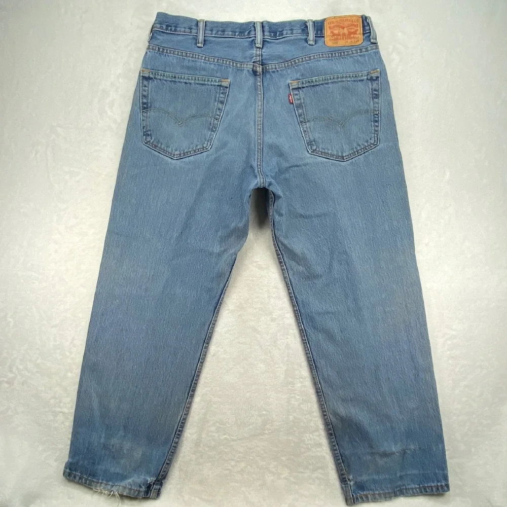 Levi's 550 Relaxed Fit‎ Jeans Faded Light Wash Denim Pants Mens W38 L29 - flaw